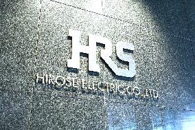 HIROSE ELECTRIC CO., LTD. (HRS) signage, logo